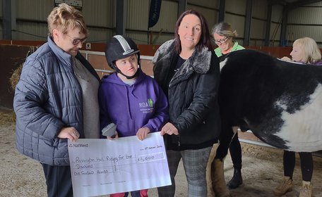 Doncaster office raises £1,000 for local riding school for the disabled